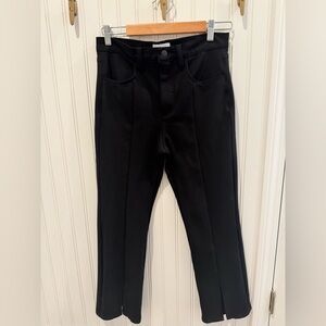 Gently worn Pistola black pants. Flair leg with front split bottom.